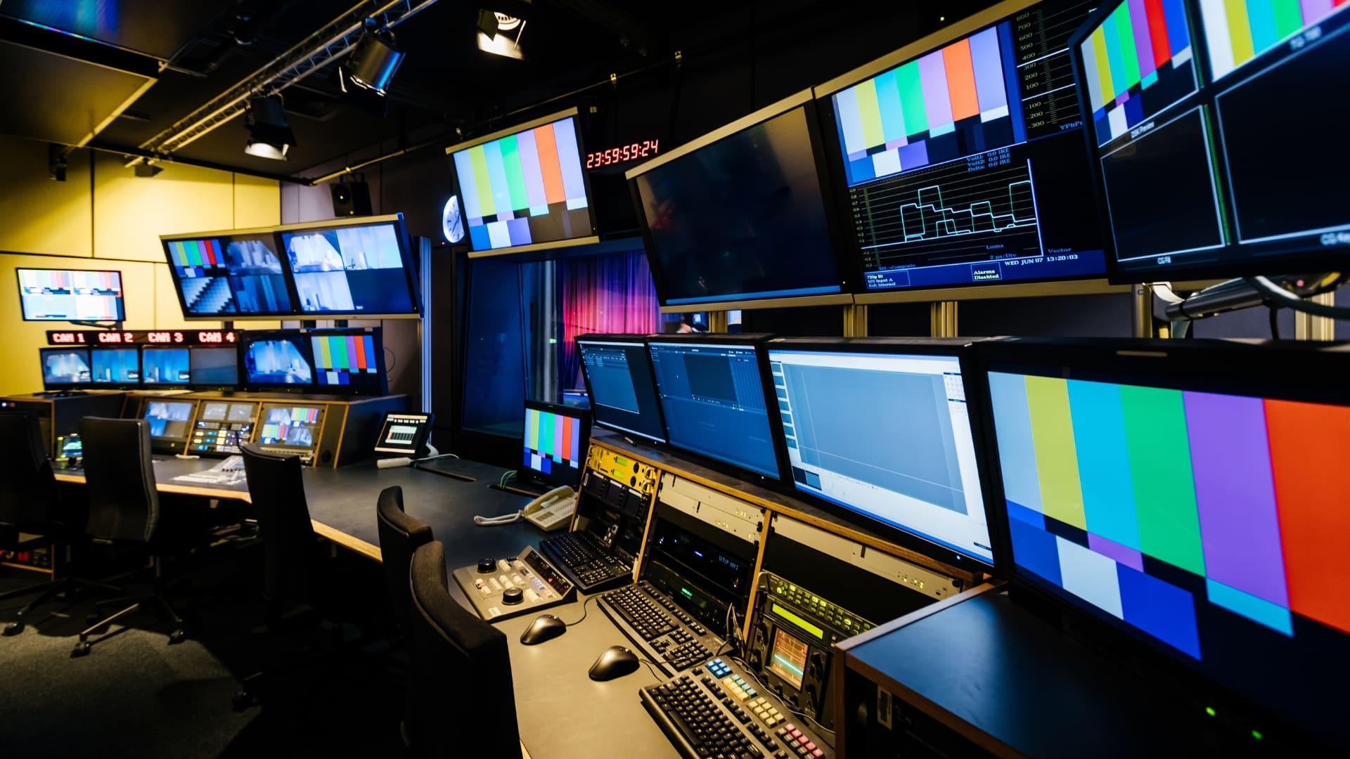 Broadcast control room with monitor wall during a live production